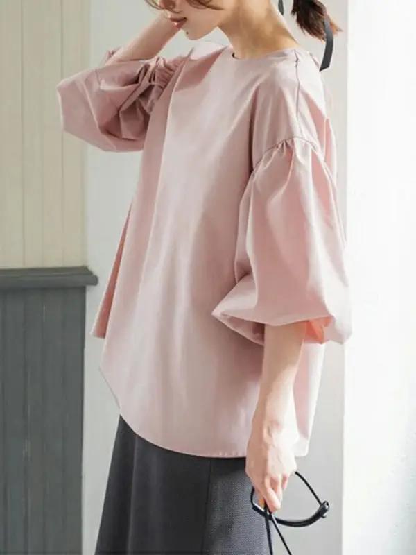 Pink lantern sleeve shirt side view
