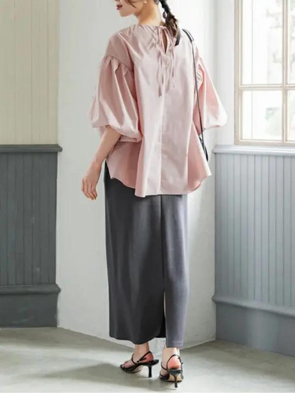 Back view of pink lantern sleeve shirt