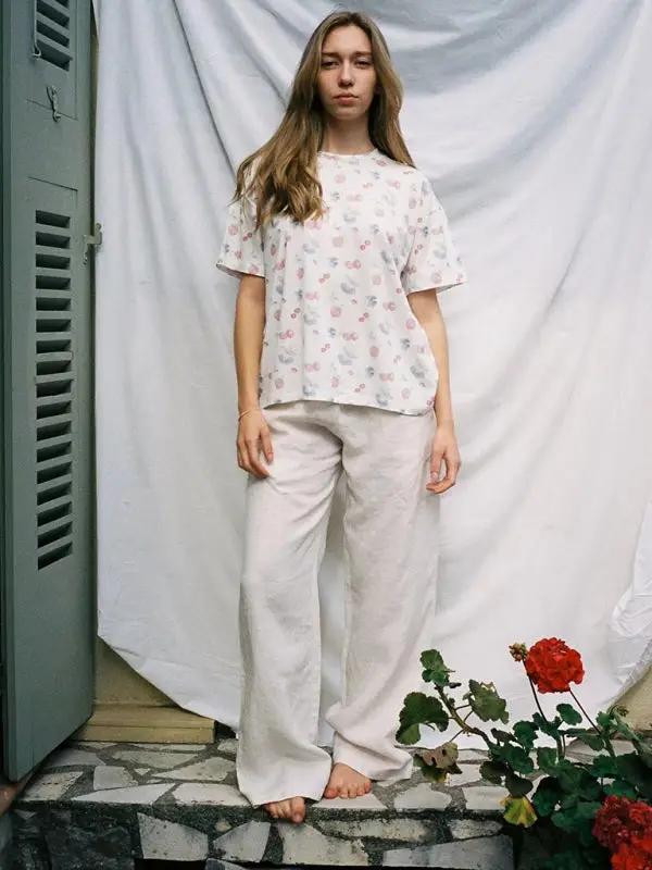 Woman in printed top with long pants
