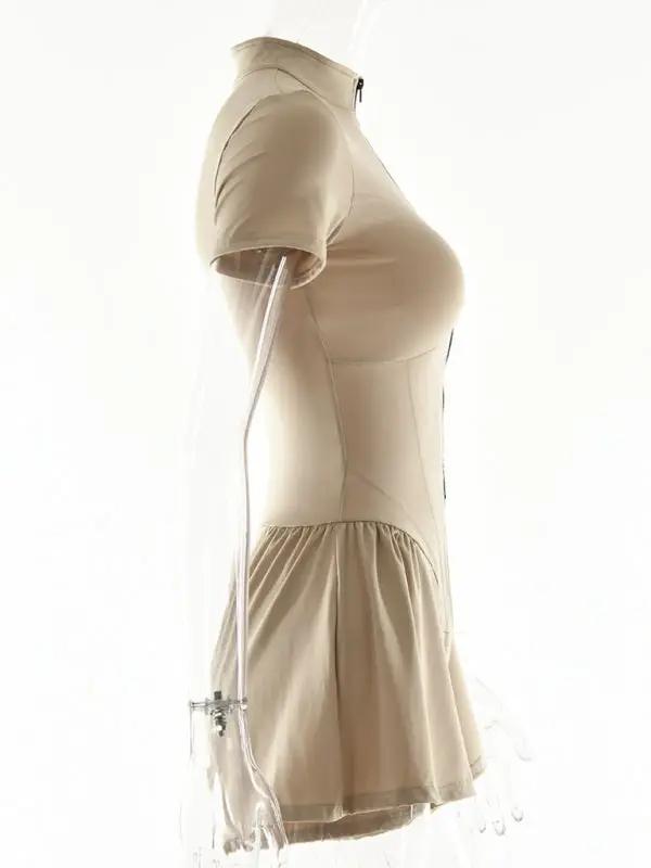 Side view of beige zipper bottoming jumpsuit
