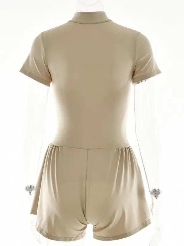 Back view of beige short sleeve jumpsuit