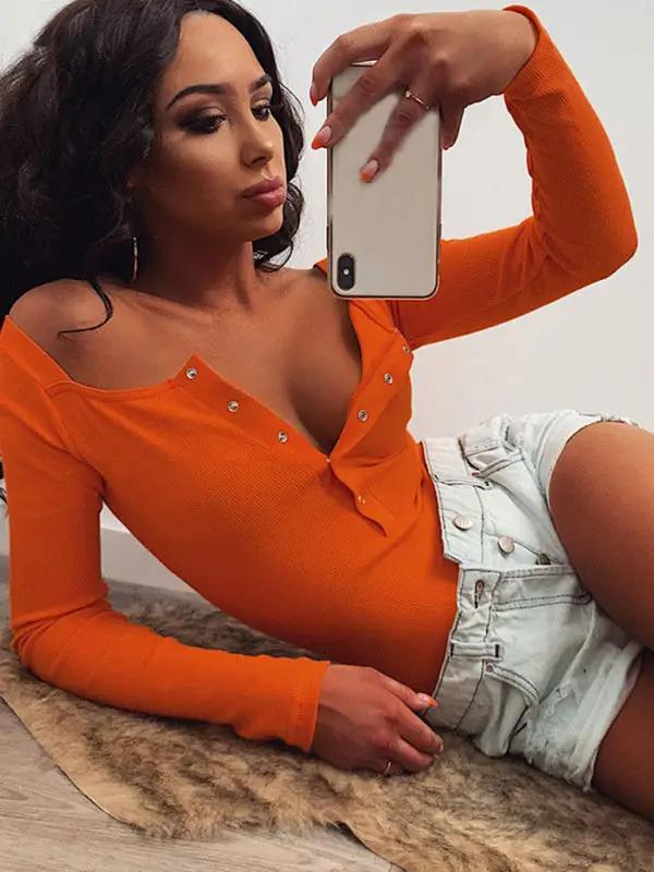 Orange buttoned long sleeve bodysuit, sexy fit