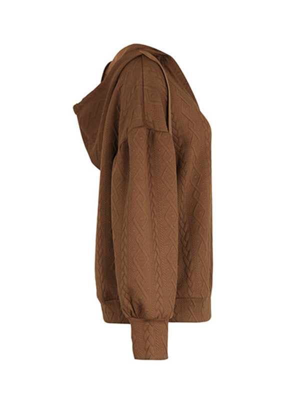 Side view of brown knitted hooded sweatshirt