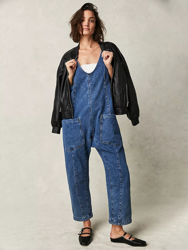 Blue denim V-neck jumpsuit with leather jacket