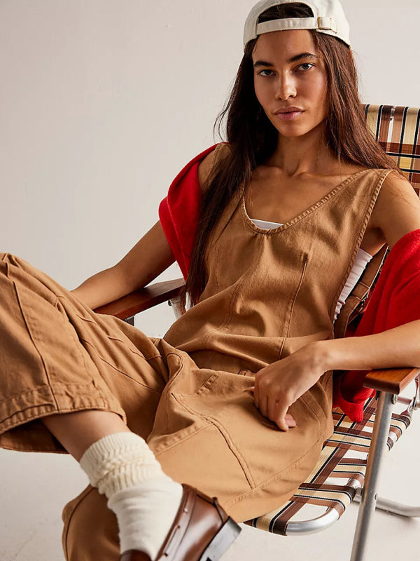 Tan V-neck jumpsuit with relaxed fit