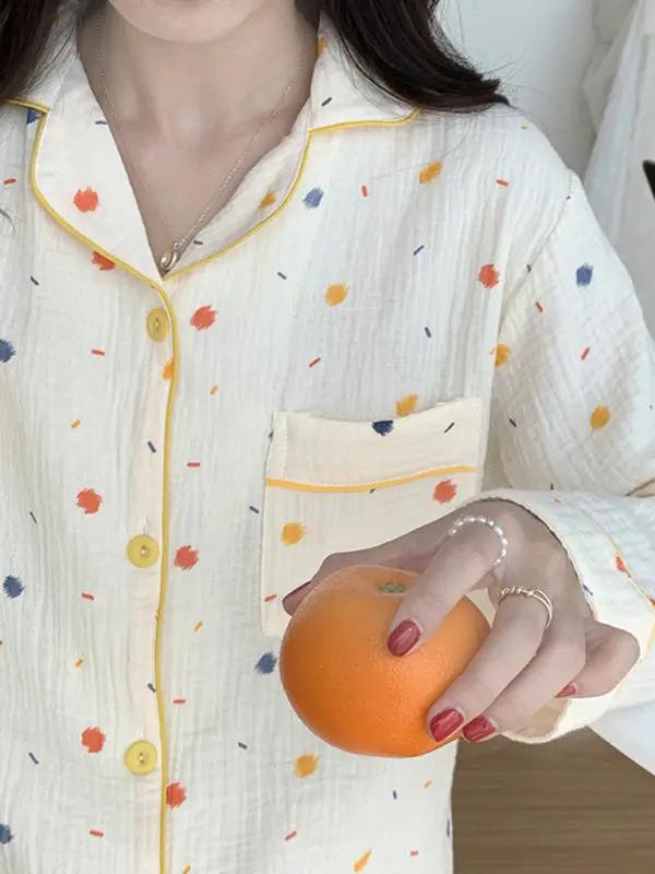 Close-up of dot print pajamas with orange
