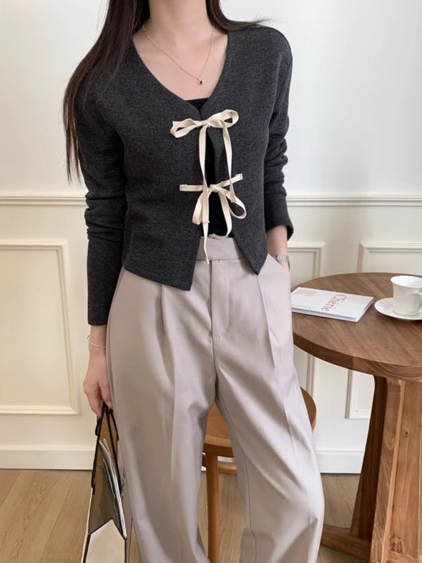 Neues modisches Strickjacken-Oberteil mit Fliege für Damen