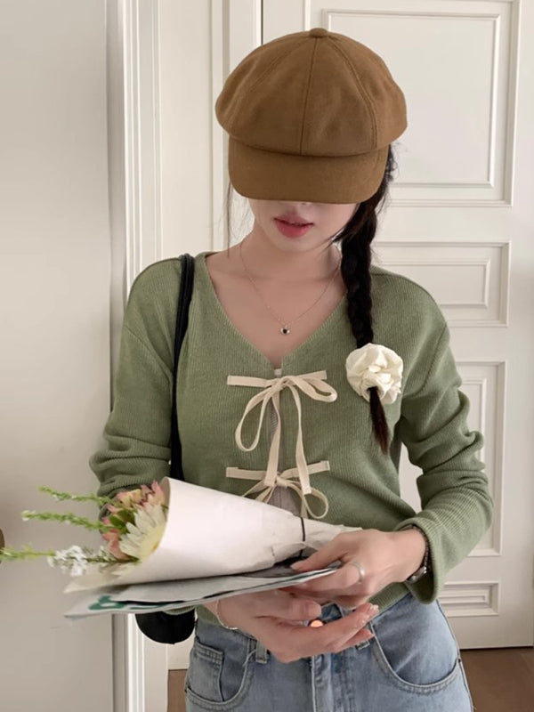 Neues modisches Strickjacken-Oberteil mit Fliege für Damen