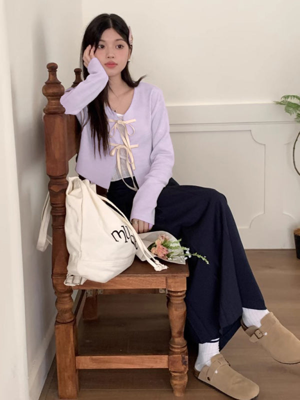 Neues modisches Strickjacken-Oberteil mit Fliege für Damen