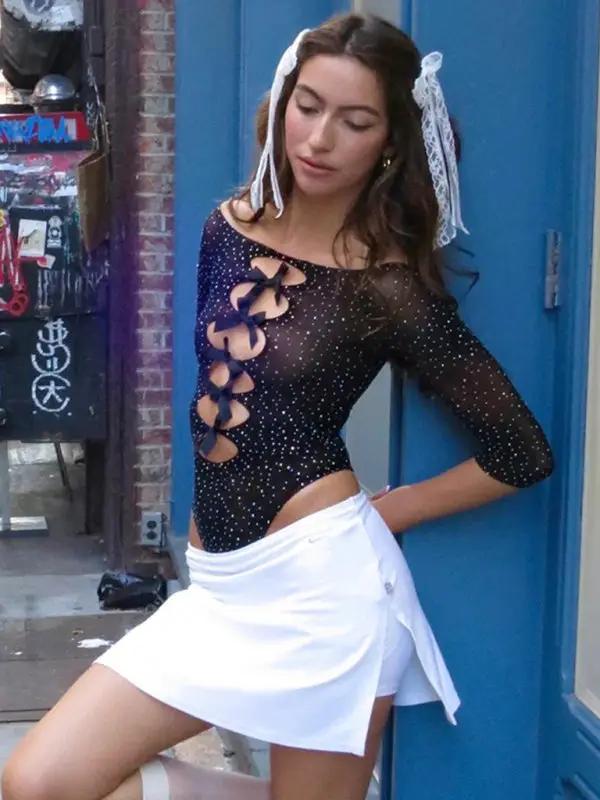 Black see-through jumpsuit with white skirt