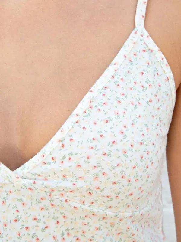 Close-up of floral V-neck suspender top