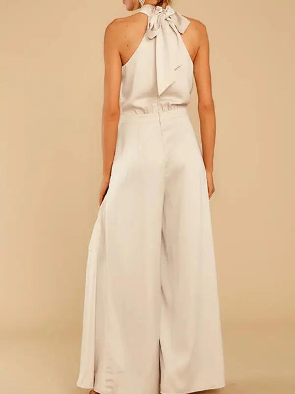 Beige halter-neck wide-leg jumpsuit, back view