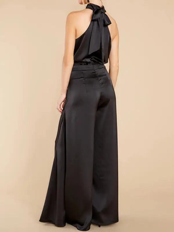 Black halter-neck wide-leg jumpsuit, back view