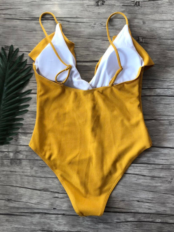 Back view of yellow ruffled one-piece swimsuit