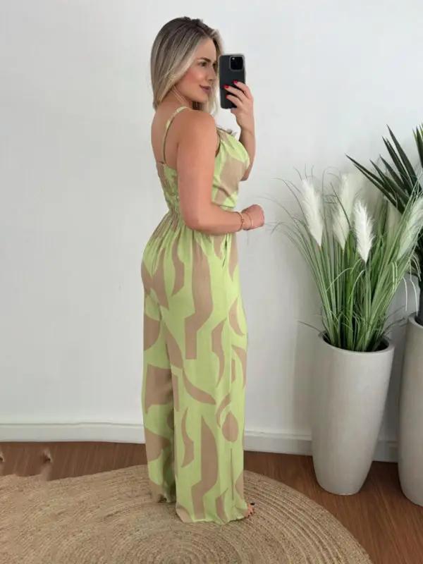 Side view of green and beige suspender jumpsuit