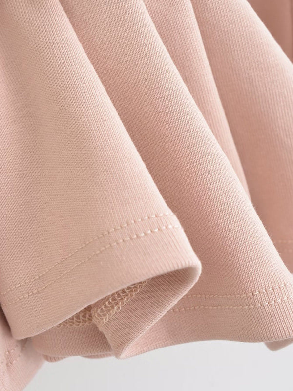 Hem detail of pink stretch skirt fabric