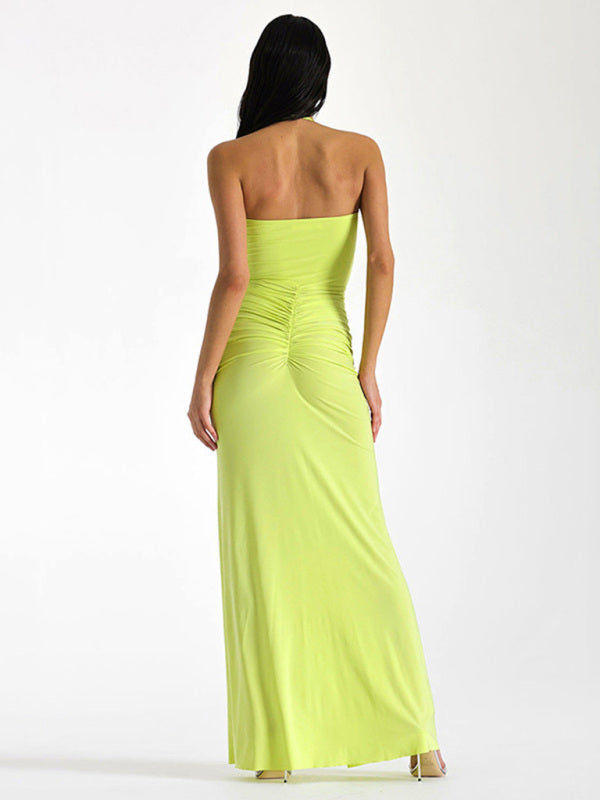 Back view of yellow halterneck slim-fit slit dress