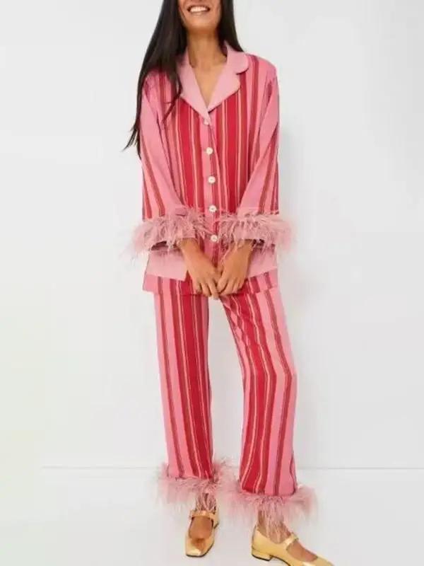 Full front view of pink striped feather-trimmed pajama set