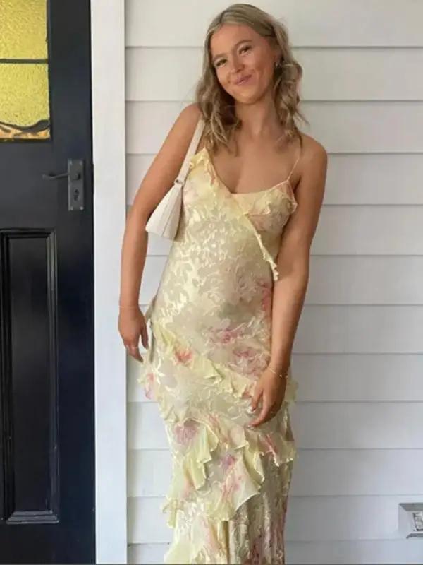 Smiling woman in wavy edge suspender dress