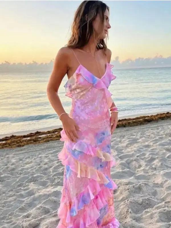 Model wearing wavy edge suspender dress by the sea