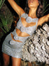 Silver dress with floral cutouts and glitter details