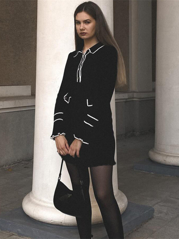 Black French lapel dress with white trim by columns