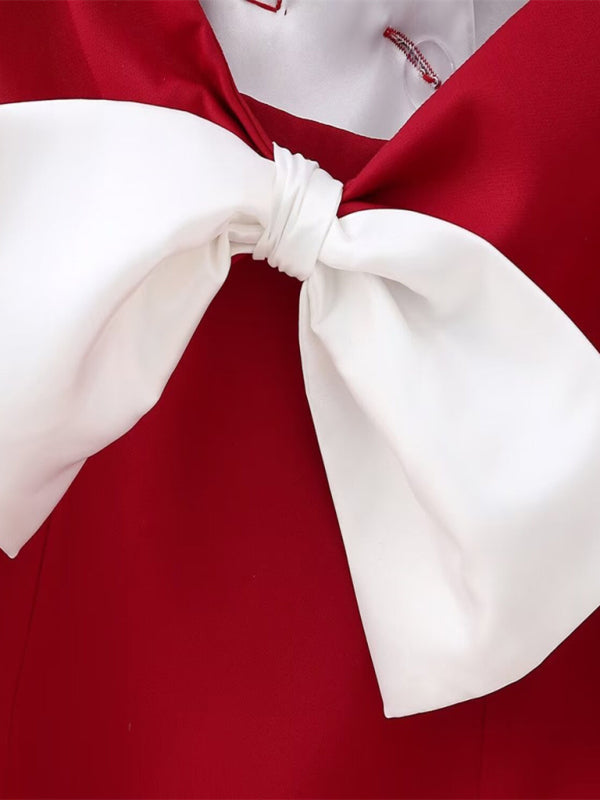 White bow detail on red dress