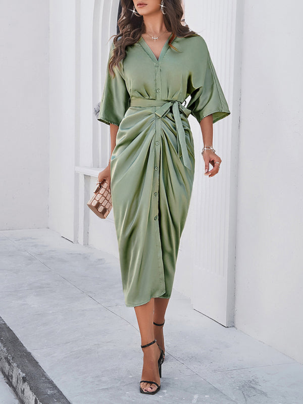 Front view of elegant green dress with waist tie