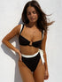 High-waisted black bikini with white accents, front view