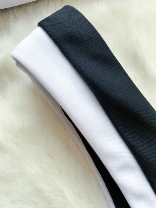 Close-up of black and white bikini fabric