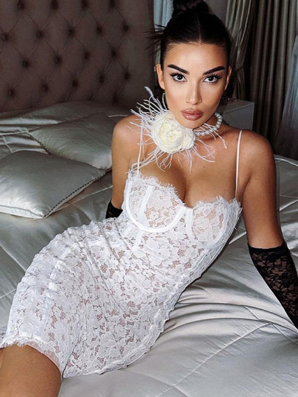 Model in white lace dress with floral choker