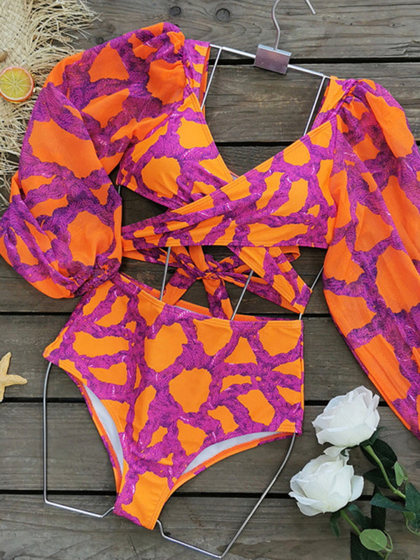 Printed long sleeve bikini set displayed on wooden surface