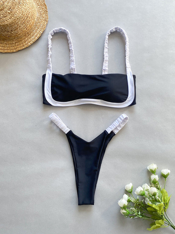 Elegant black and white bikini with split design