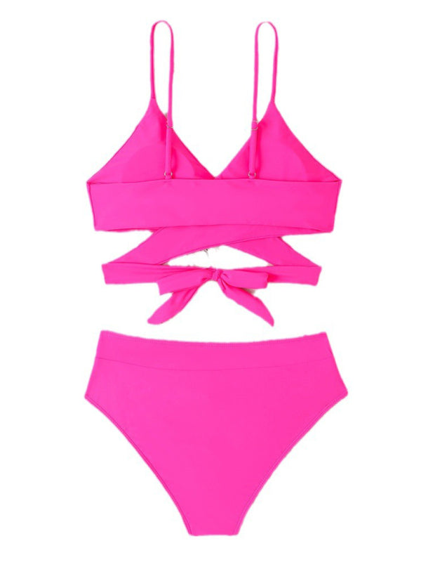 Pink high waist strappy split swimsuit flat lay