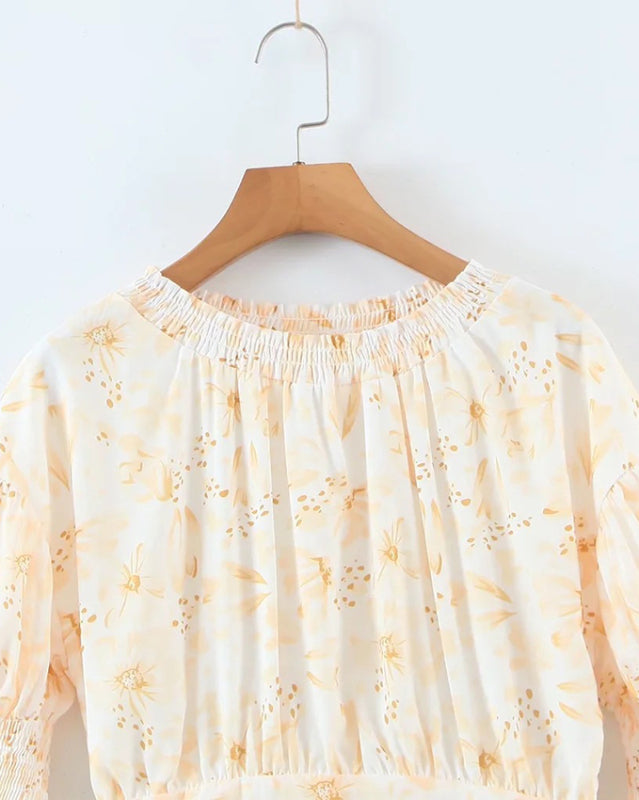 Elastic neckline of pleated pastoral style dress