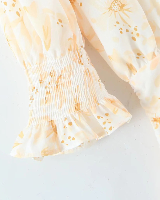 Elastic cuff detail on pastoral style dress sleeve