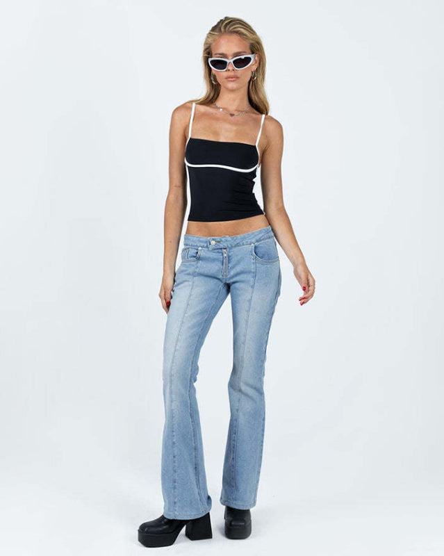Model in black camisole and jeans