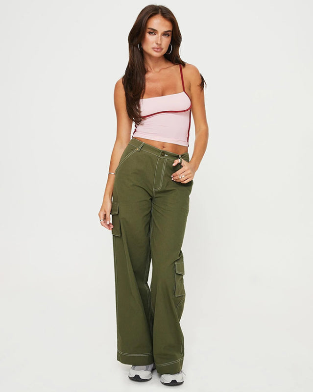 Full view of pink camisole with green pants