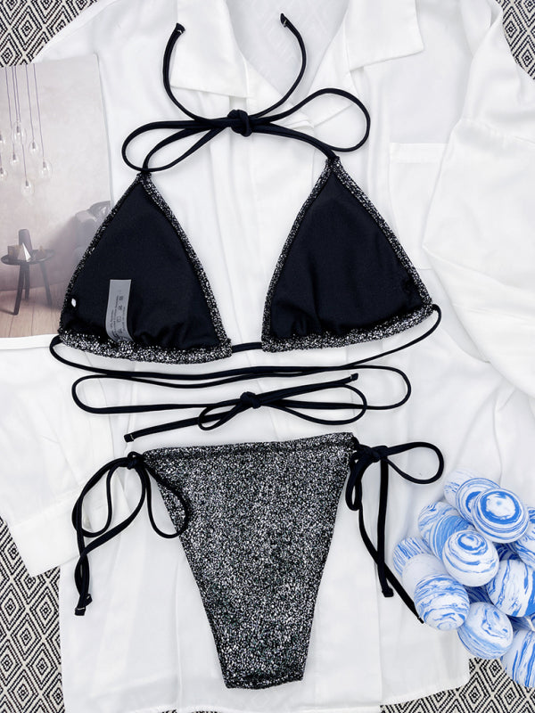 Black glitter strap triangle bikini on white fabric