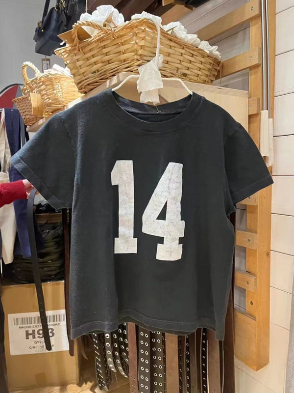Black retro distressed T-shirt with number 14 on hanger