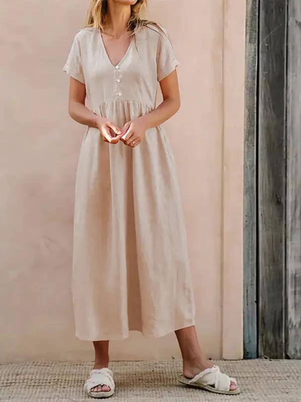 Solid color loose dress with short sleeves, front view