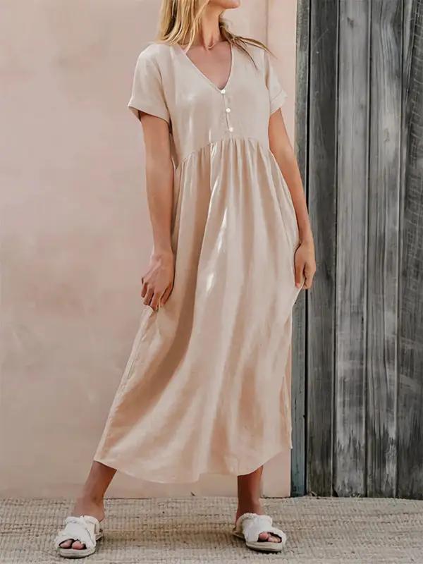Side view of elegant loose dress in solid color