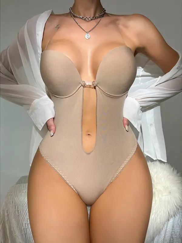 Model wearing nude backless plunge bodysuit