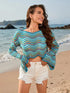 Blue and orange wavy striped crochet top on beach
