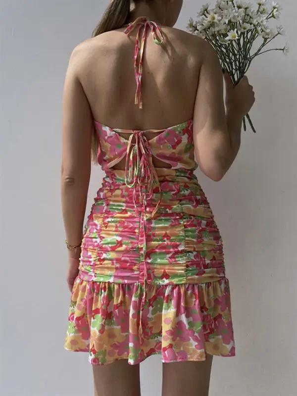 Back view of pink floral print dress with tie straps