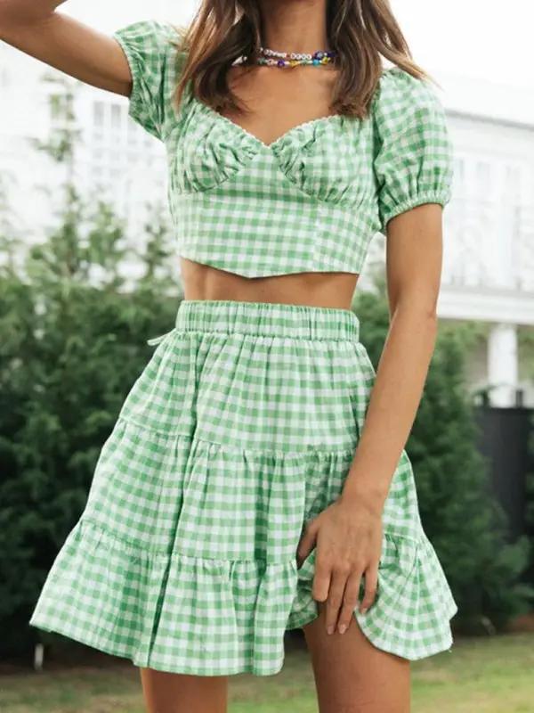 Close-up of green plaid backless tie top and skirt
