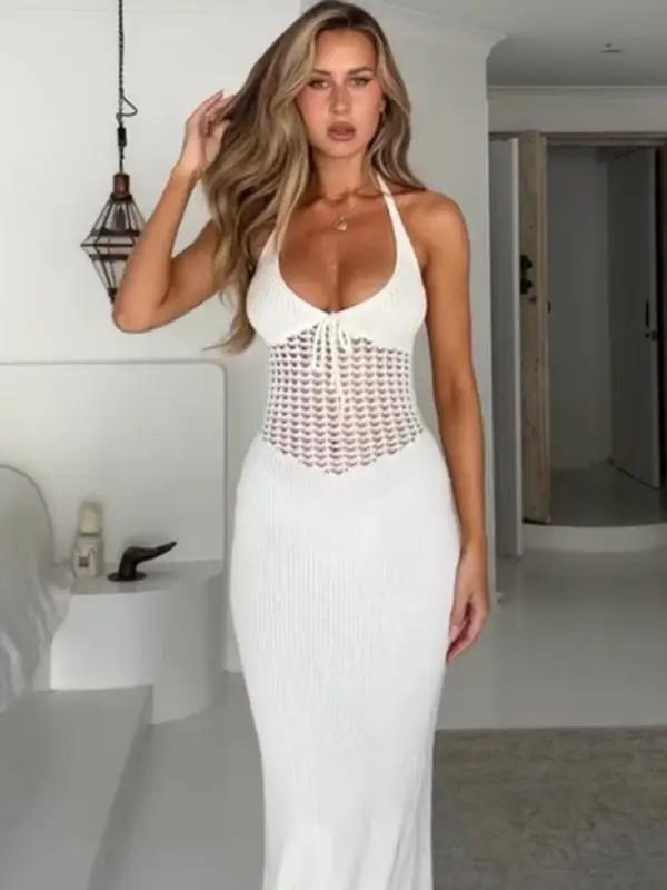Stylish halterneck backless knitted dress in white indoors