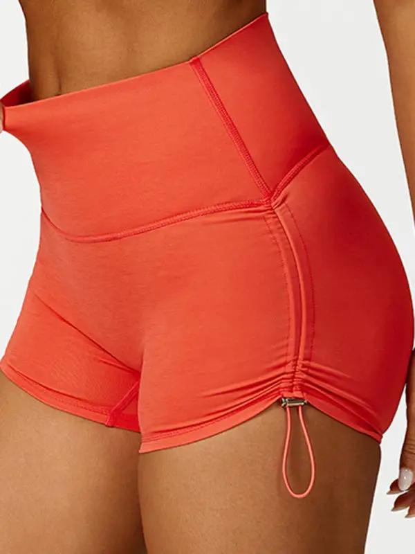 Orange drawstring yoga shorts, breathable and tight fit