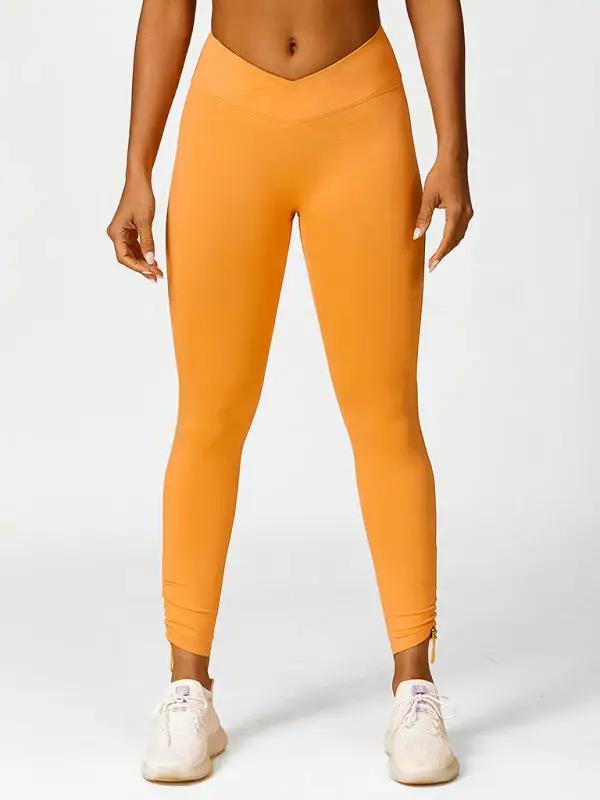 Orange yoga leggings, front view