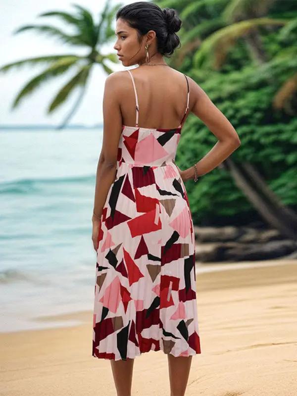 Back view of geometric print midi dress by sea